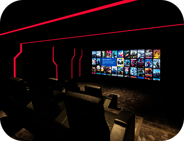 Imagem de uma sala equipada com home theater e tv na parede